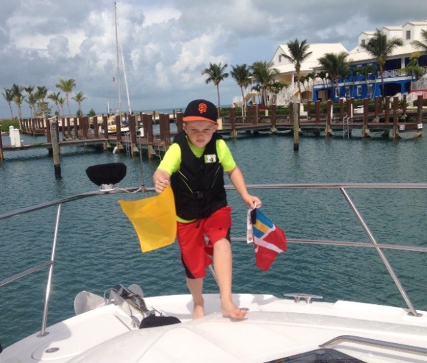 (2014) Ryan swapping the quarantine flag & courtesey flag, West End Bahamas