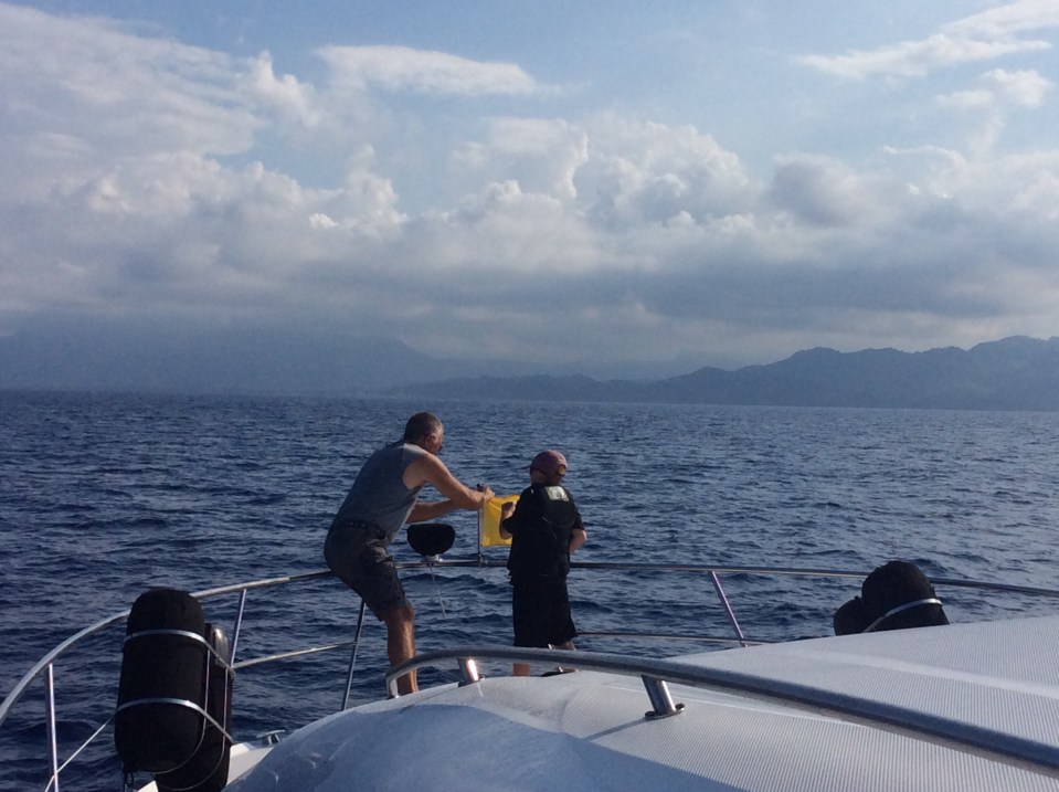 Randy & Ryan hoisting the quarantine flag approaching Dominican Republic