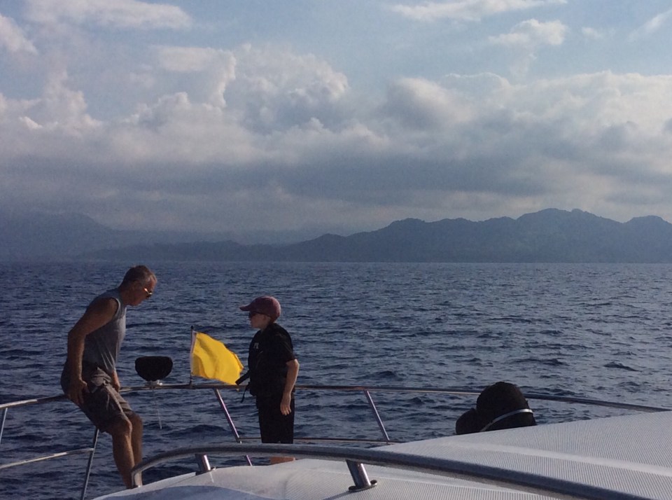 Randy & Ryan hoisting the quarantine flag approaching Dominican Republic