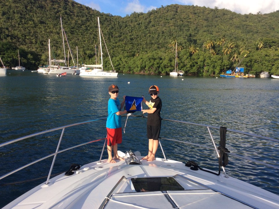 Ronan & Ryan Hoisting the St. Lucia Courtesy Flag