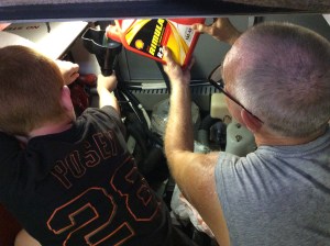 Ryan & Randy changing the oil in the generator