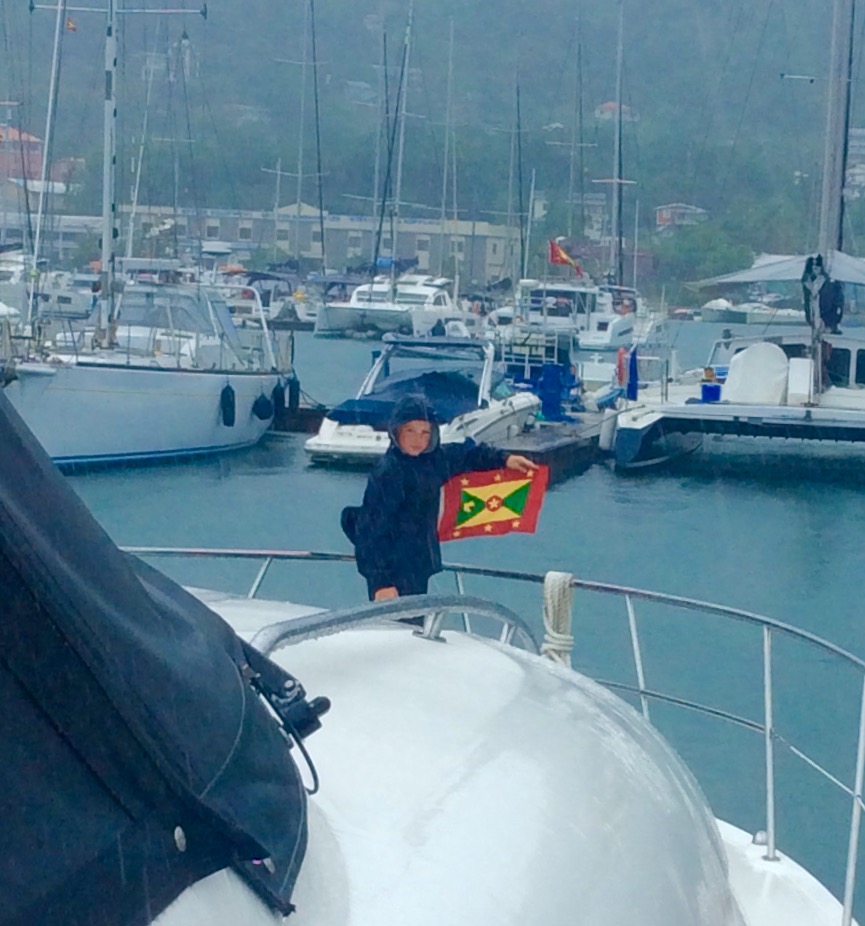Ryan hoisting the courtesy flag, Grenada