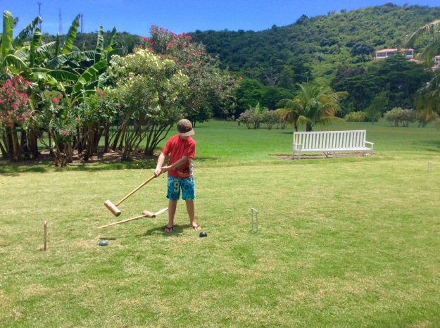 Ronan playing croquet, Mount Cinnamon Resort, St. Georges, Grenada