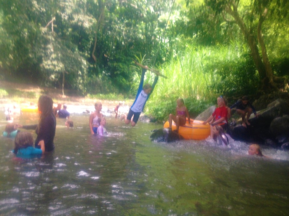 Fun on the rope swing after tubing down the river