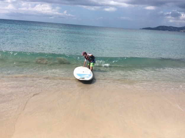 Ryan tackles the stand up paddle board, Mount Cinnamon, Grand Anse Beach, Grenada