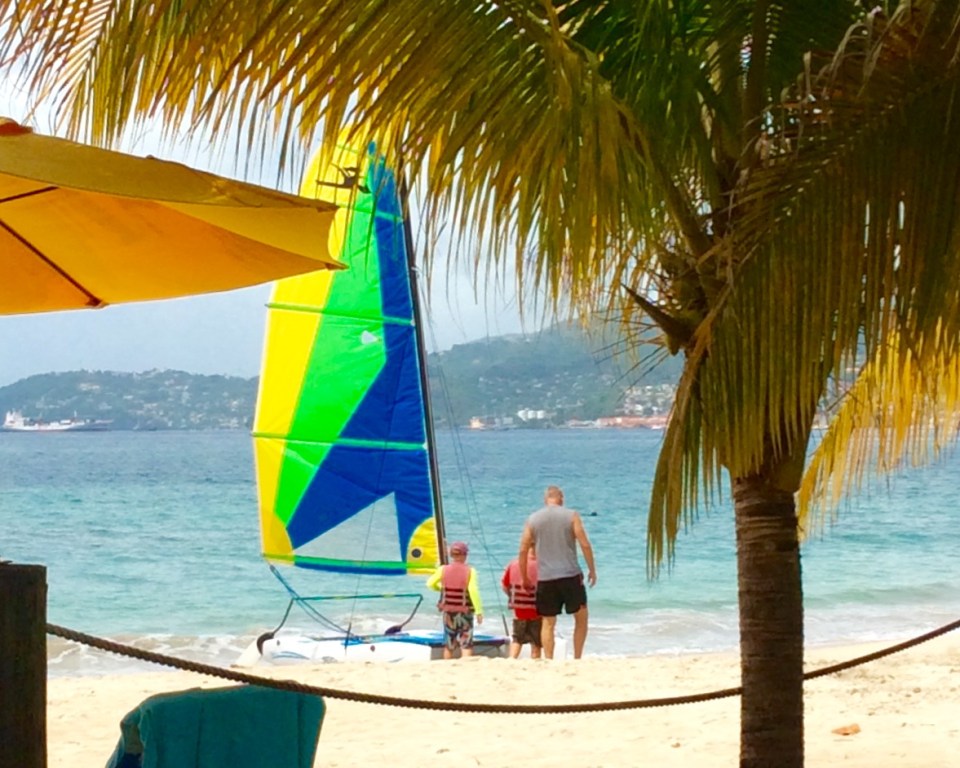 Ryan and Ronan getting ready to take Randy out sailing on the Hobie Cat, Grand Anse Beach, Grenada