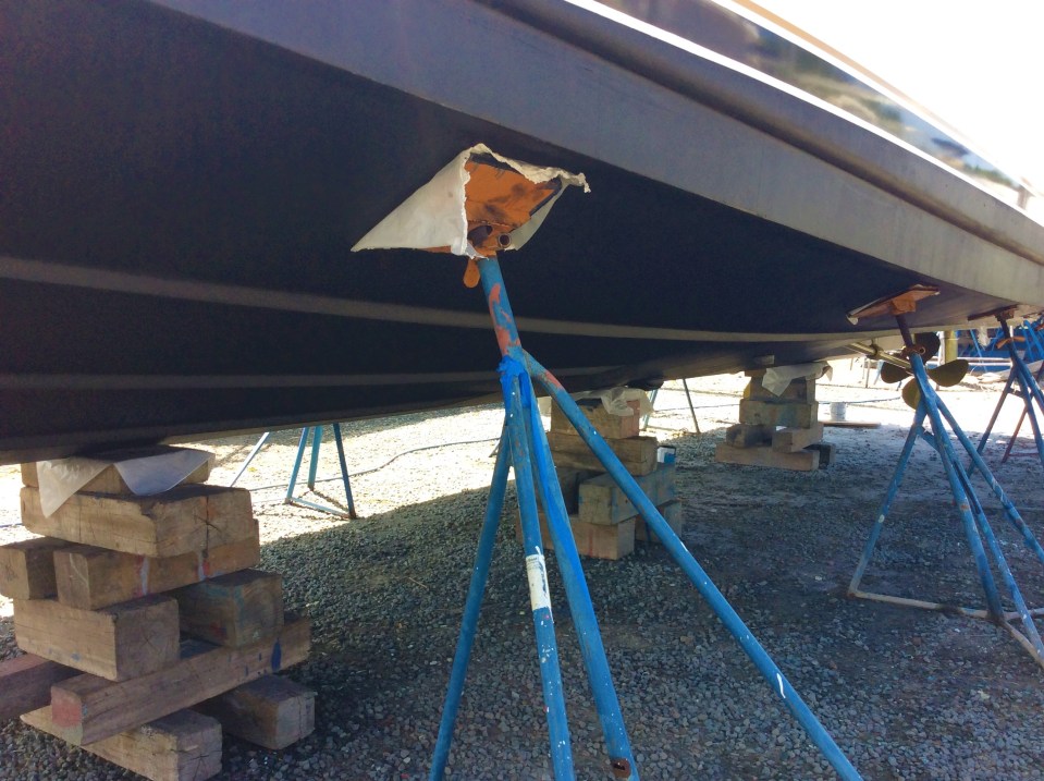 Bottom paint nearly done, now to get under those chock blocks!