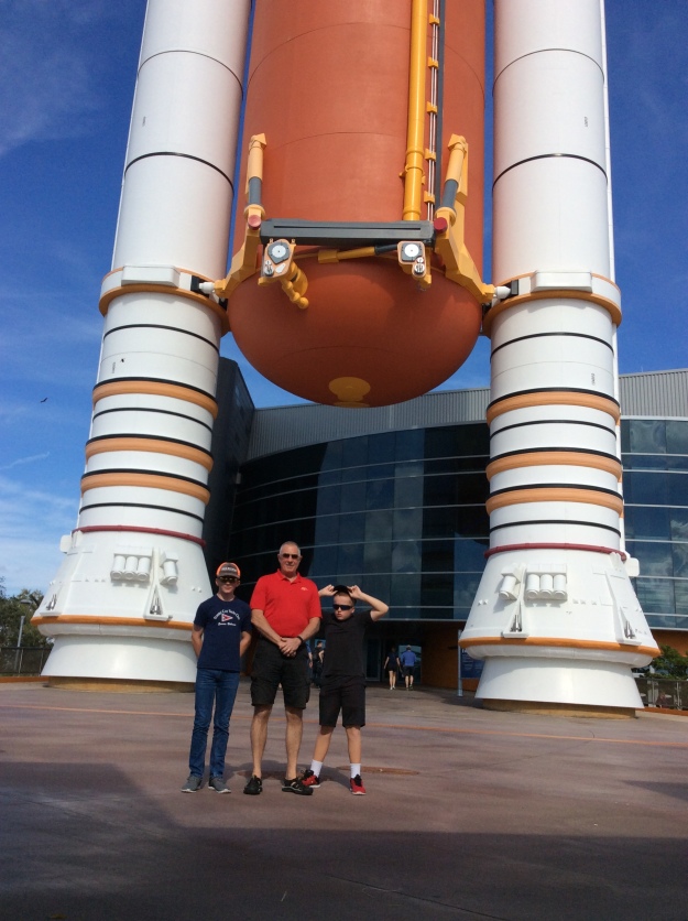 Ryan, Randy, & Ronan at the feet fo the Atlantis Rocket, Cape Canaveral, 12/17