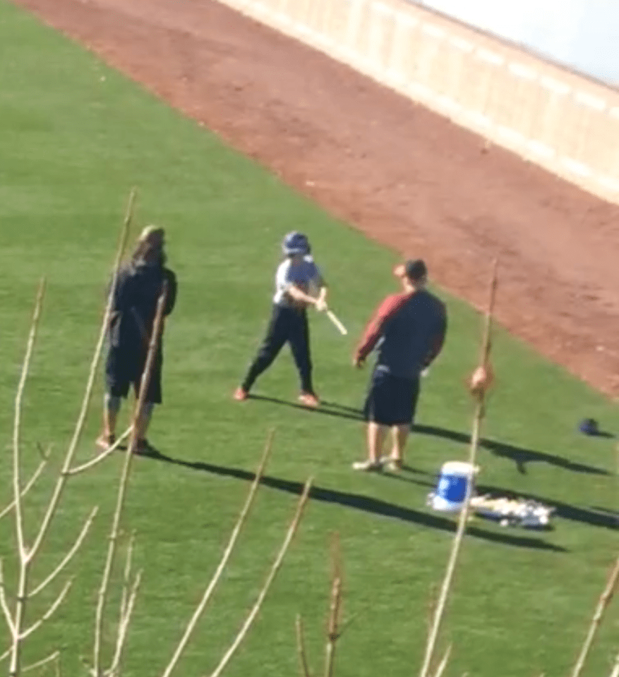 Ronan getting batting tips from Brandon Crawford (Jan. 2018)