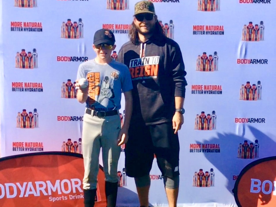 Ryan with his baseball signed by Brandon Crawford (Jan. 2018)