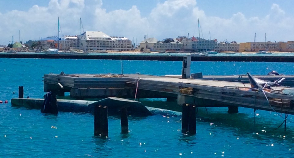 Damaged docks, sunken vessel, missing roofs, Fort Louis Marina / Marigot Bay St. Martin (March 2018)