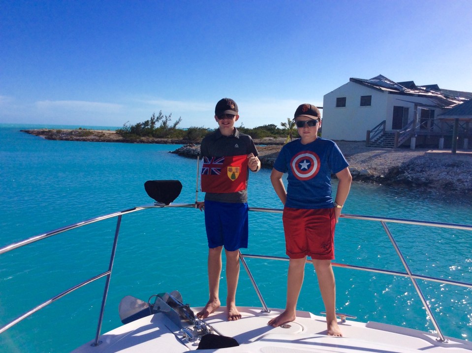 Ryan & Ronan hoisting the Turks & Caicos courtesey flag (2018)
