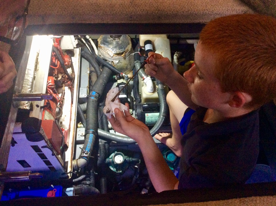 Ryan checking the dip stick oil level