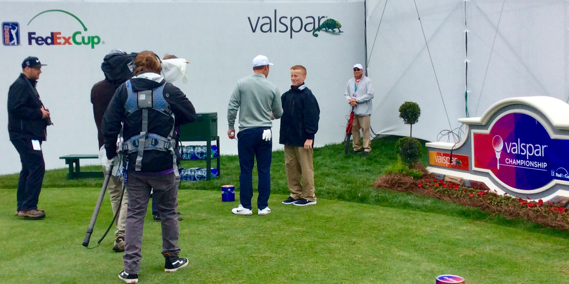 Reigning PGA Valspar champion, Paul Casey, surprises Ronan during his interview on the 18th hole (2019 PGA Valspar Championship)